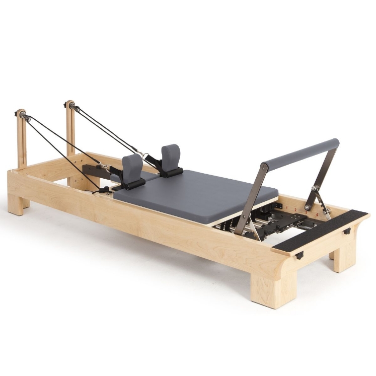 Poza cu Reformer Pilates din Lemn Profesional – Stabilitate și Performanță pentru Studio