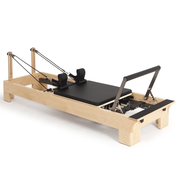 Poza cu Reformer Pilates din Lemn Profesional – Stabilitate și Performanță pentru Studio